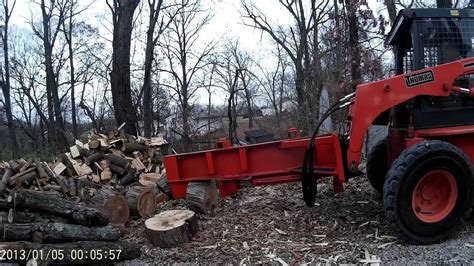 skid steer log splitter video|homemade skid steer log splitter.